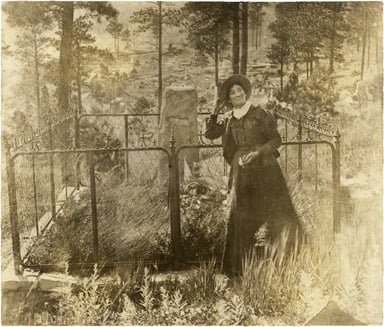 Calamity Jane at Wild Bill Hickok's Gravesite, Deadwood, Dakota Territory.